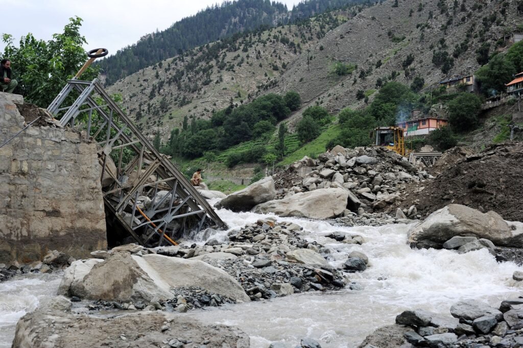 Collapsed infrastructure amidst flash floods in northern Chitral